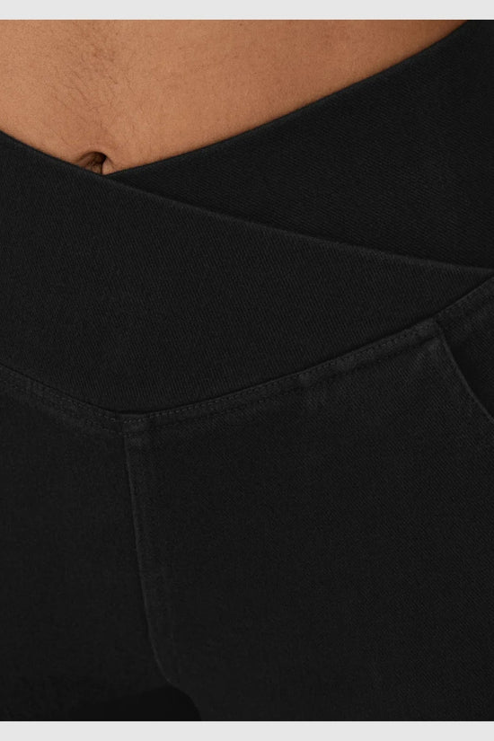 Pantalon évasé croisé taille haute en denim extensible